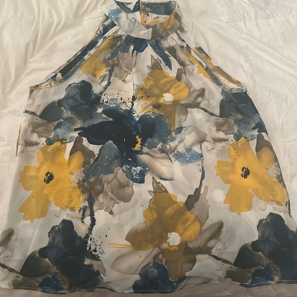 Beautiful ladies sleeveless floral top.